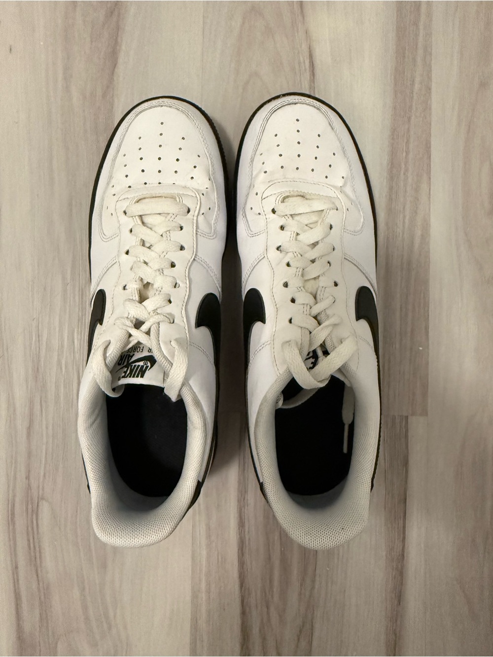 Nike White and Black Low-Top Sneakers with Swoosh